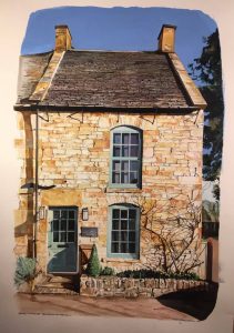 the image depicts a Cotswold stone cottage with sage green windows and door.
