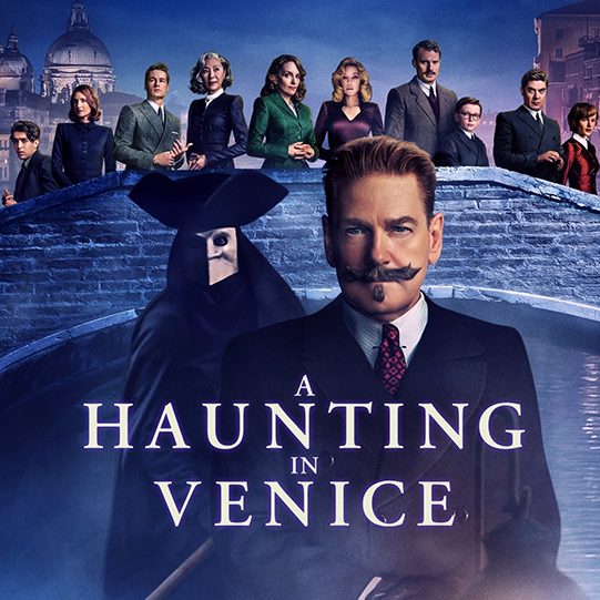 A poster for the film, A Haunting in Venice. A moustached man stands in front of a masked person. Behind them are 10 people standing on a stone bridge.